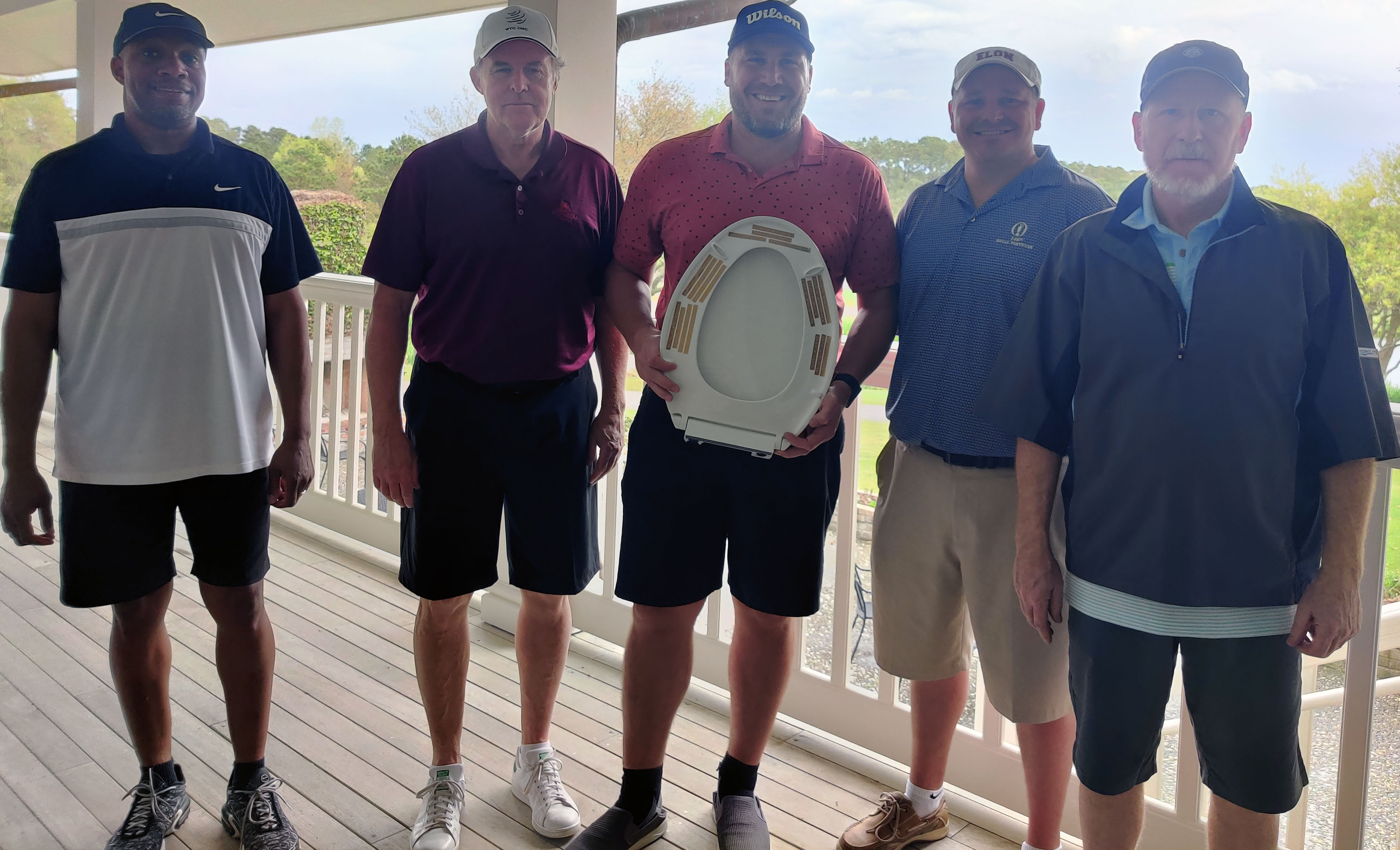Scott Ward holding his Kohler Trophy pictured with the other four players who managed to make it to the final round on Sunday at The Dye Club.
